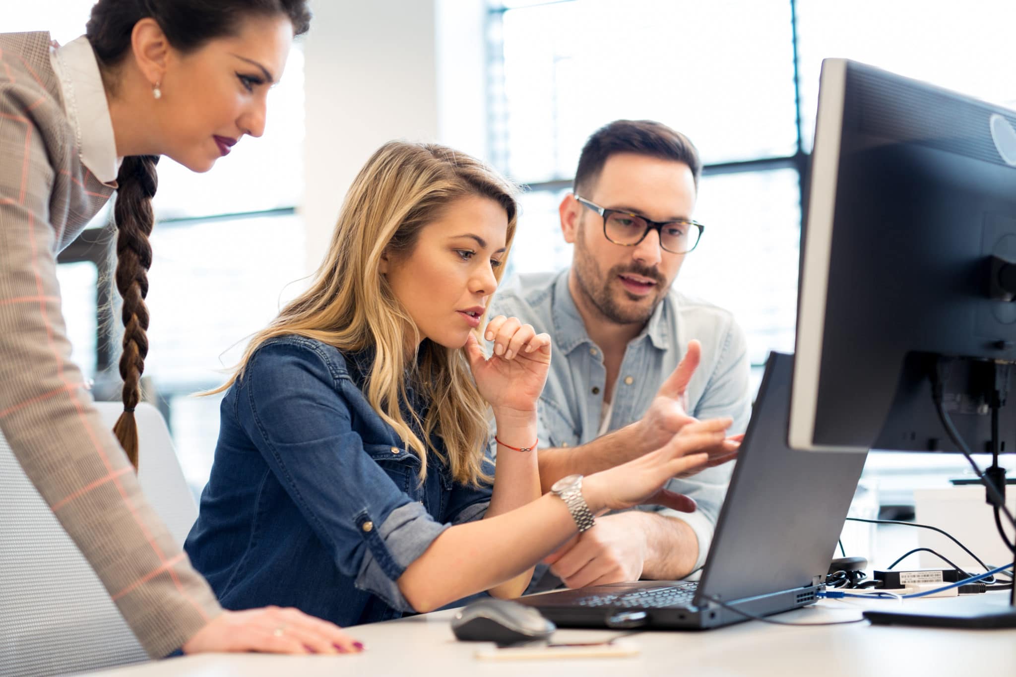 Group Of Business People And Software Developers Working As A Team In Office Group Of Business People And Software Developers Working As A Team In Office
