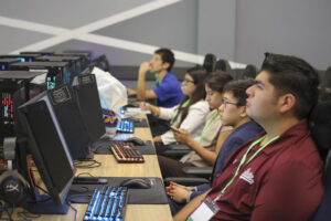 Graduate students listening to presentation